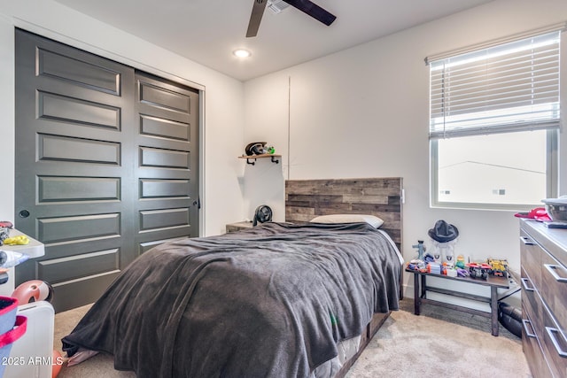 bedroom with recessed lighting, light colored carpet, ceiling fan, and baseboards