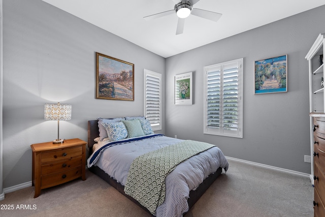 bedroom featuring ceiling fan, carpet floors, and baseboards