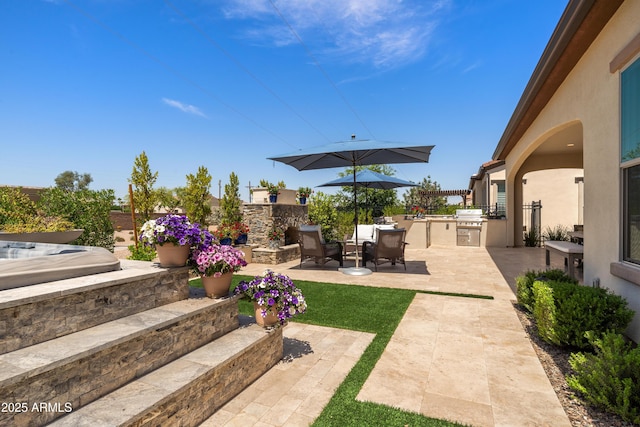 view of yard featuring fence, outdoor dining space, a patio, and exterior kitchen