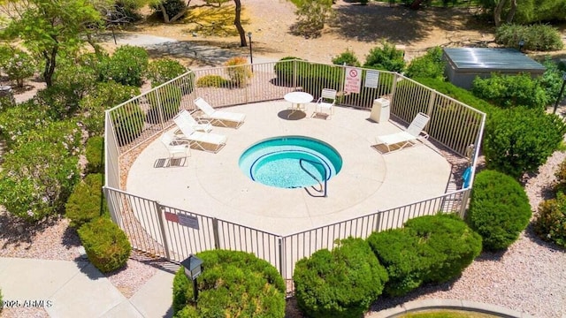 15151 N Frank Lloyd Wright Blvd Unit 2086, Scottsdale, AZ 85260 - view of swimming pool with a community hot tub and a patio area