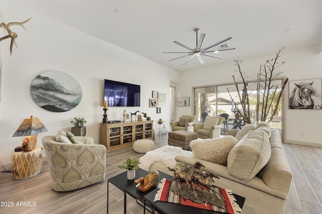 living room featuring ceiling fan