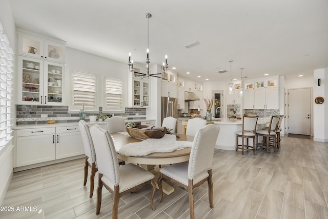 dining room featuring plenty of natural light