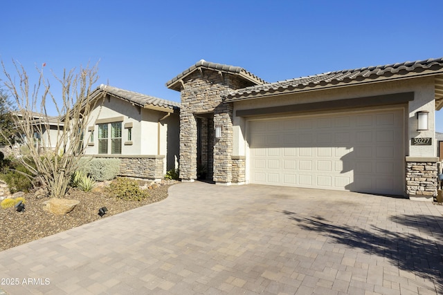 view of front of property with a garage