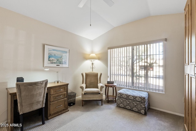 living area featuring ceiling fan, vaulted ceiling, and light carpet