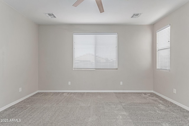 19873 W San Juan Ave, Litchfield Park, AZ 85340 - spare room with ceiling fan, carpet floors, and baseboards