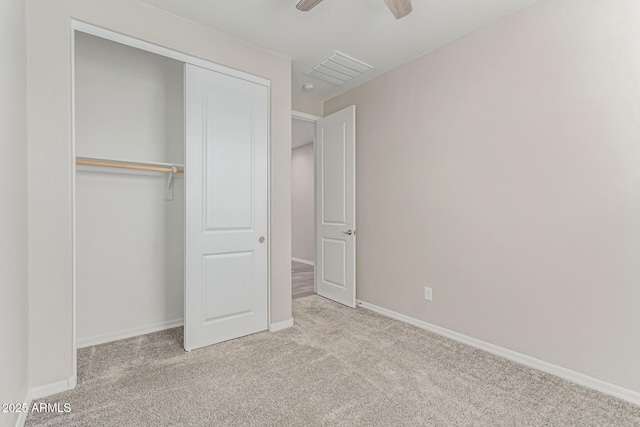 19873 W San Juan Ave, Litchfield Park, AZ 85340 - unfurnished bedroom with carpet floors, a closet, baseboards, and ceiling fan