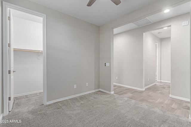 19873 W San Juan Ave, Litchfield Park, AZ 85340 - carpeted spare room with ceiling fan, baseboards, recessed lighting, and wood finished floors