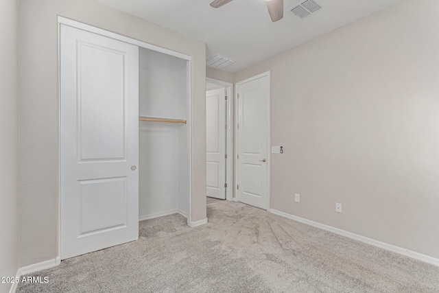 19873 W San Juan Ave, Litchfield Park, AZ 85340 - unfurnished bedroom with carpet floors, a closet, baseboards, and a ceiling fan
