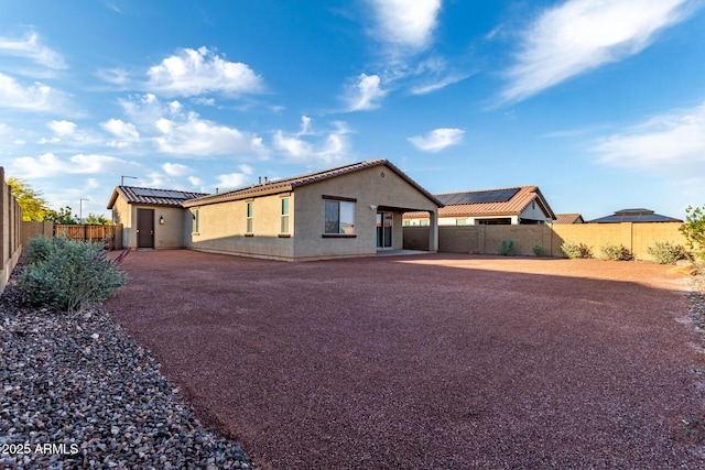 19873 W San Juan Ave, Litchfield Park, AZ 85340 - ranch-style home with a fenced backyard, stucco siding, a patio, and a tile roof