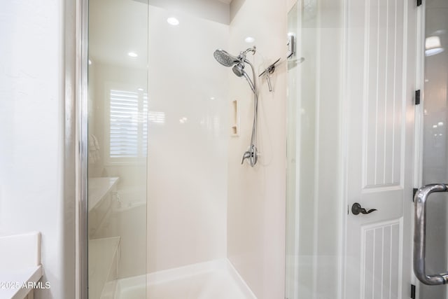 bathroom featuring a stall shower