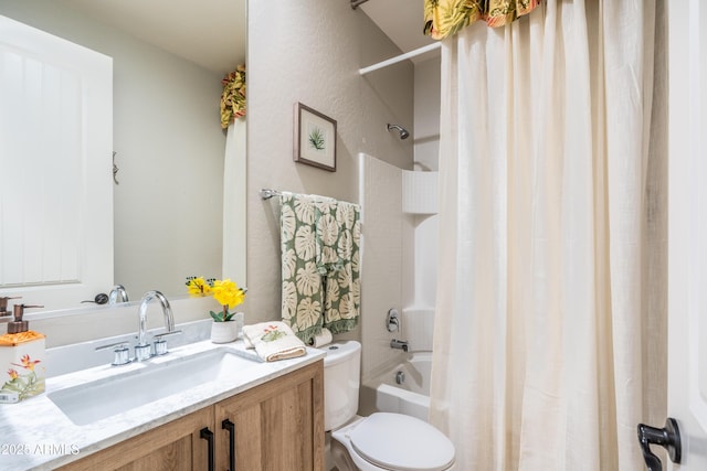 bathroom with a textured wall, shower / bathtub combination with curtain, toilet, and vanity