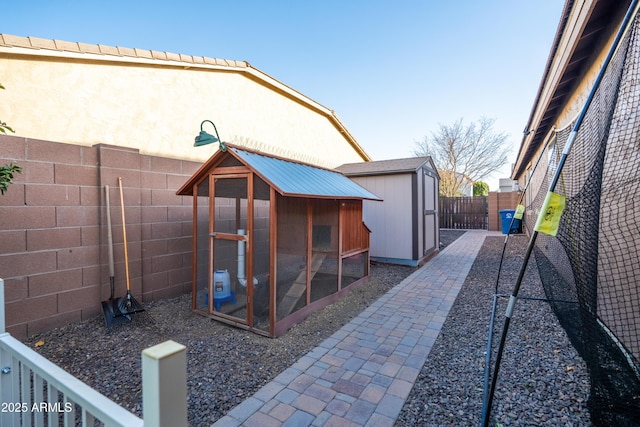 exterior space with a fenced backyard