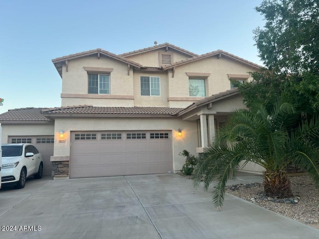 view of front of house with a garage