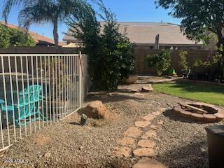 view of yard featuring a fire pit