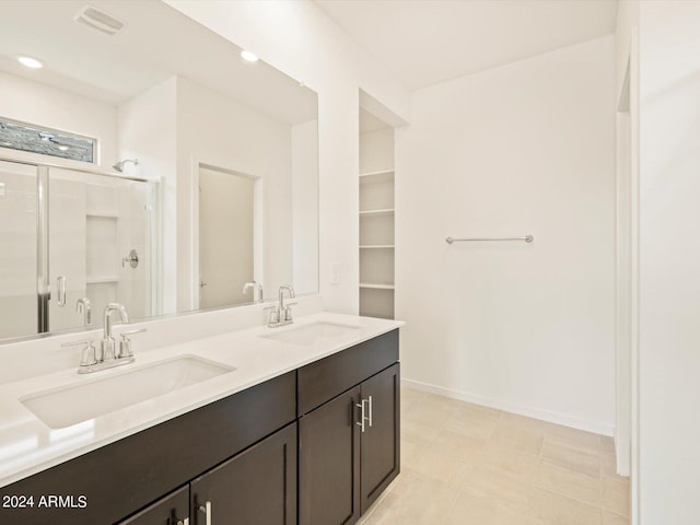 bathroom featuring vanity and walk in shower