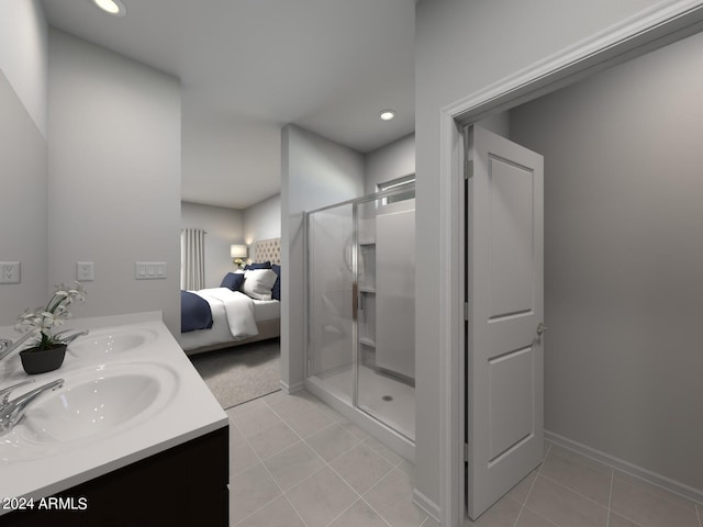 bathroom featuring a shower with door, vanity, and tile patterned floors