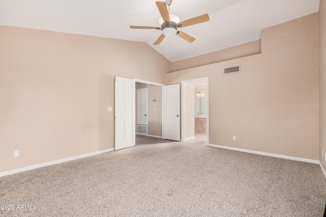 interior space featuring vaulted ceiling, baseboards, and ceiling fan