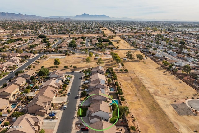 bird's eye view with a mountain view