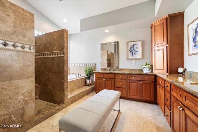 bathroom with a walk in shower, a garden tub, recessed lighting, vanity, and tile patterned floors