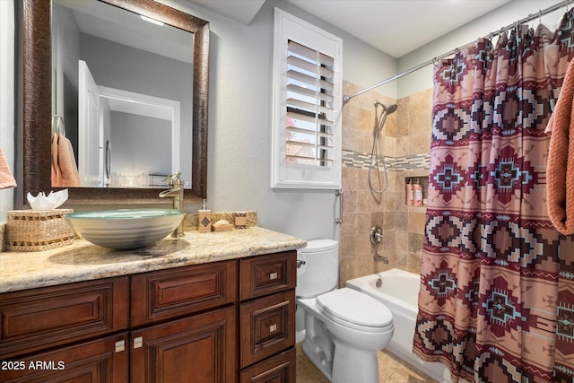 full bath with toilet, shower / bathtub combination with curtain, and vanity