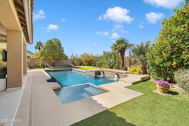 view of pool featuring a pool with connected hot tub, a fenced backyard, and a lawn