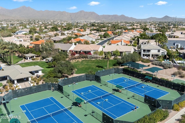 drone / aerial view with a residential view and a mountain view