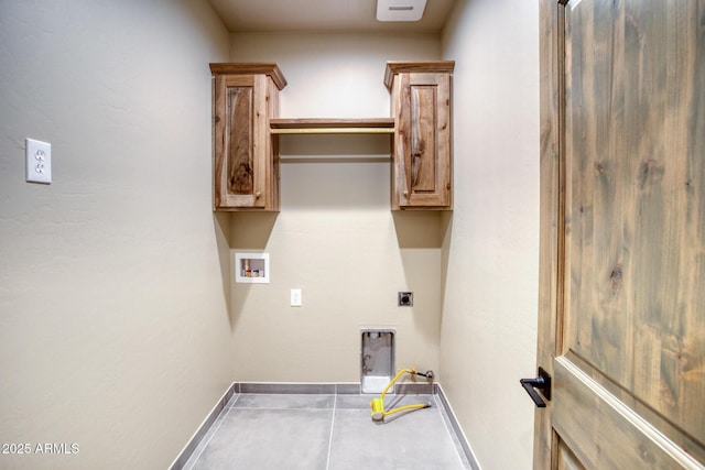 washroom with electric dryer hookup, hookup for a gas dryer, cabinets, and hookup for a washing machine