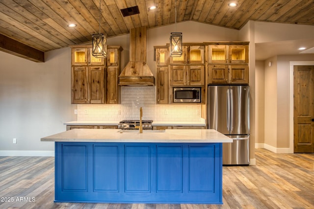 kitchen featuring wood ceiling, a center island with sink, stainless steel appliances, and custom exhaust hood