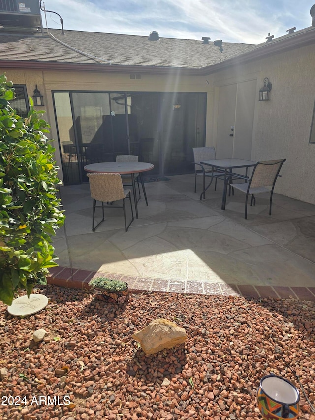 view of patio / terrace with central air condition unit