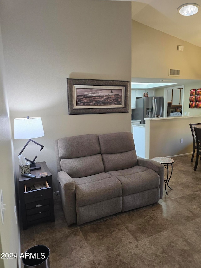 living room with vaulted ceiling