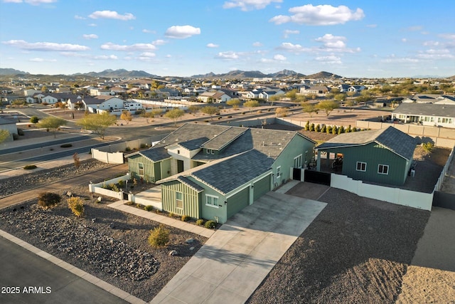 drone / aerial view featuring a mountain view