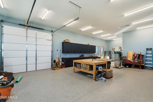 garage featuring a workshop area