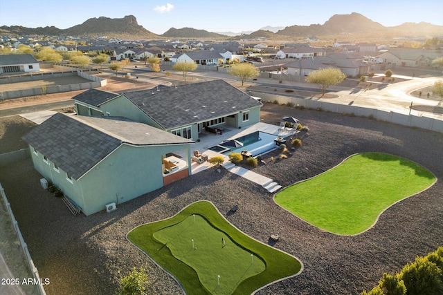 drone / aerial view featuring a mountain view