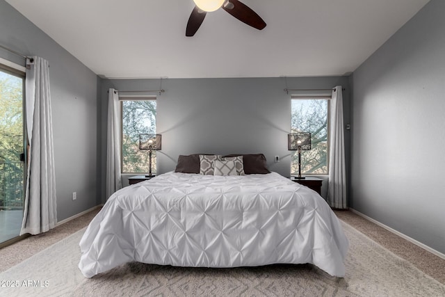 bedroom with ceiling fan and carpet