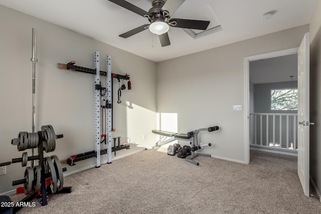 exercise room featuring light colored carpet and ceiling fan