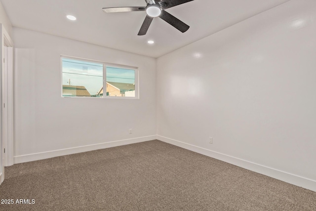 carpeted empty room featuring baseboards, recessed lighting, and a ceiling fan