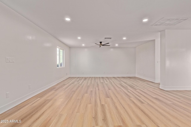 unfurnished room with light wood finished floors, recessed lighting, ceiling fan, and visible vents