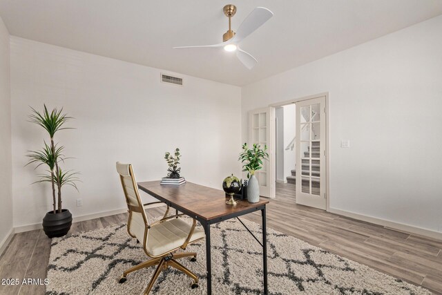 453 E Baylor Ln, Gilbert, AZ 85296 - office area featuring light wood-style floors, ceiling fan, and baseboards