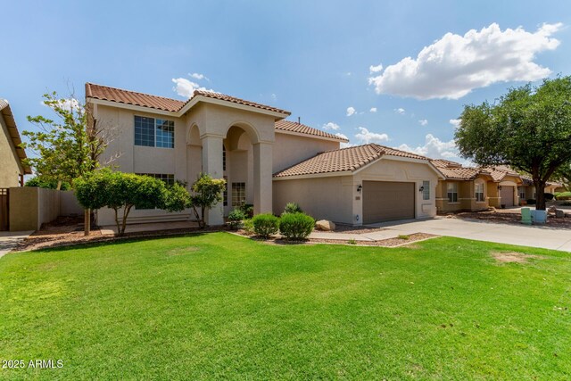 453 E Baylor Ln, Gilbert, AZ 85296 - mediterranean / spanish-style house with stucco siding, an attached garage, and a tiled roof