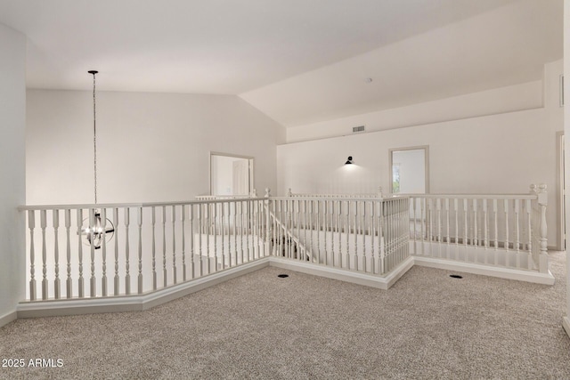 453 E Baylor Ln, Gilbert, AZ 85296 - spare room with carpet flooring, vaulted ceiling, and a chandelier