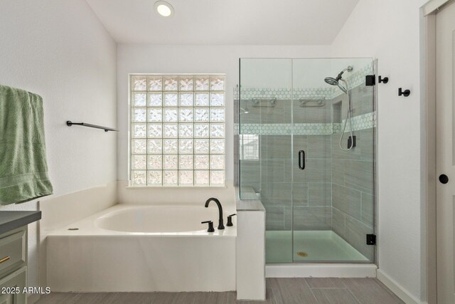 453 E Baylor Ln, Gilbert, AZ 85296 - bathroom featuring a garden tub, a shower stall, vanity, and recessed lighting