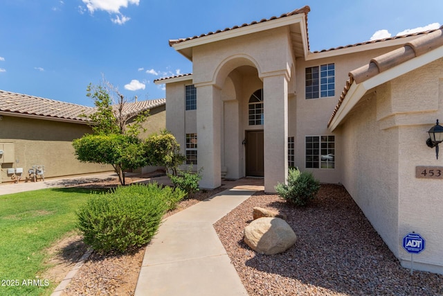 453 E Baylor Ln, Gilbert, AZ 85296 - doorway to property with stucco siding and a tiled roof