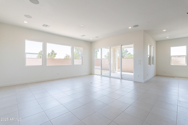 spare room with recessed lighting, visible vents, baseboards, and light tile patterned floors