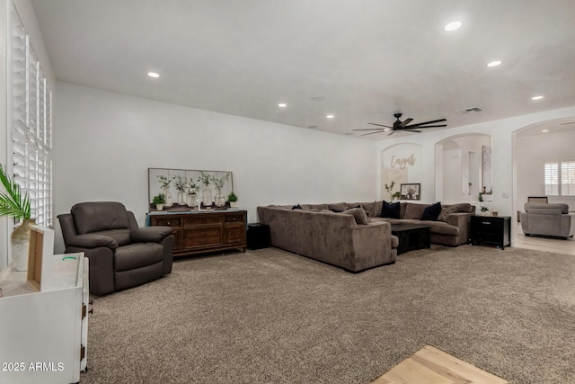 465 E Frances Ln, Gilbert, AZ 85295 - carpeted living area featuring arched walkways, recessed lighting, and ceiling fan