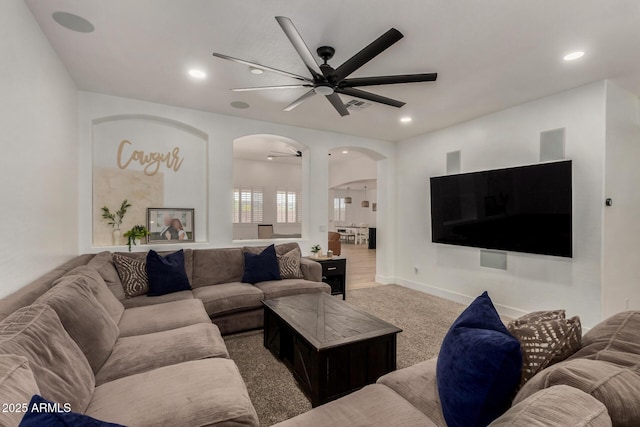 465 E Frances Ln, Gilbert, AZ 85295 - carpeted living area featuring arched walkways, ceiling fan, and recessed lighting