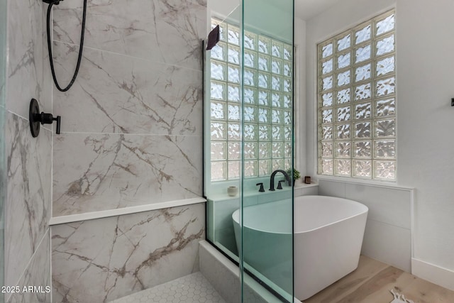 465 E Frances Ln, Gilbert, AZ 85295 - bathroom featuring a freestanding tub, a marble finish shower, and healthy amount of natural light
