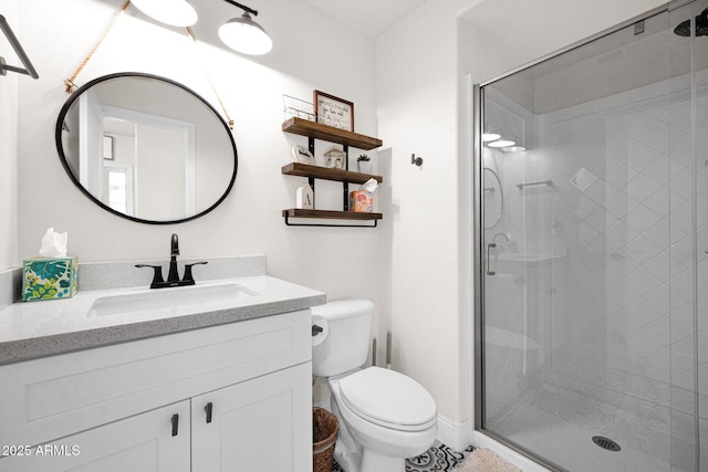 full bath with toilet, a stall shower, and vanity