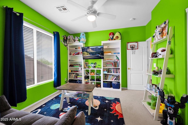 game room with a ceiling fan, carpet floors, baseboards, and visible vents