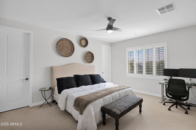 bedroom with light colored carpet and ceiling fan