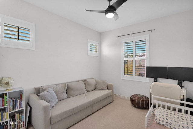 carpeted bedroom with ceiling fan